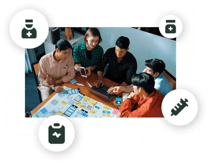 Start up team reviewing plans and mockups